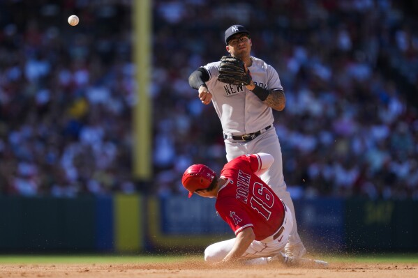 Angels complete sweep of Yankees with 7 3 win finishing New